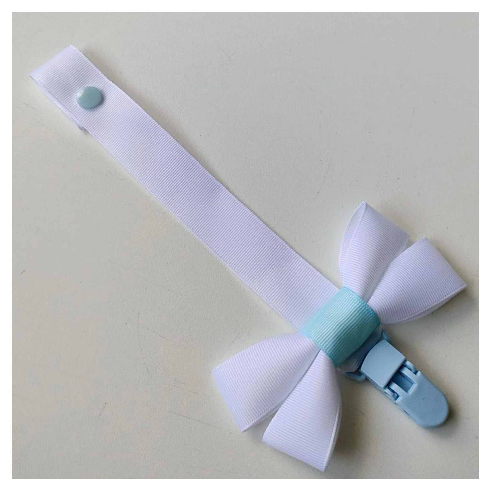 White & Blue Dummy Clip With Bow