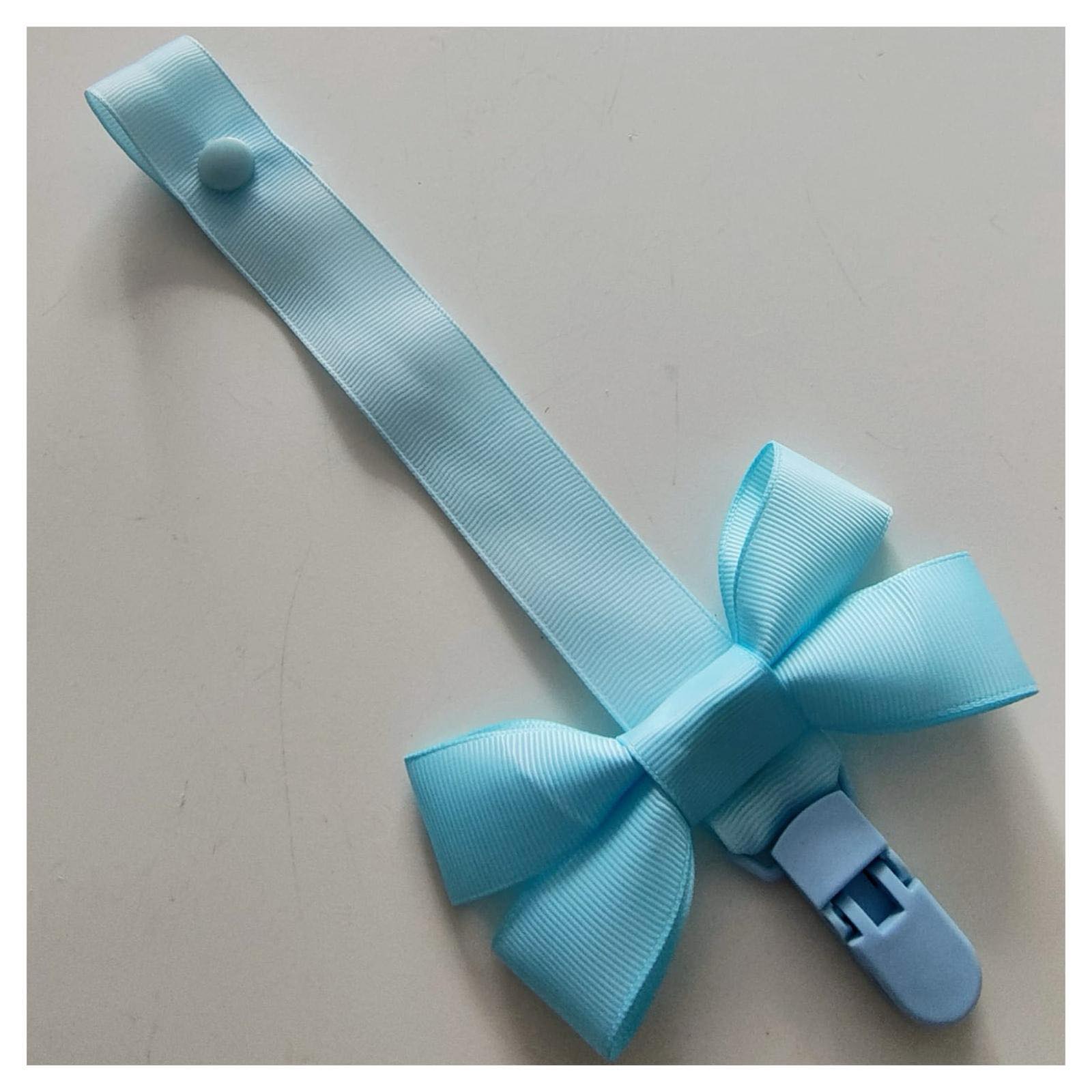 Light Blue Dummy Clip With Bow And Blue Clip