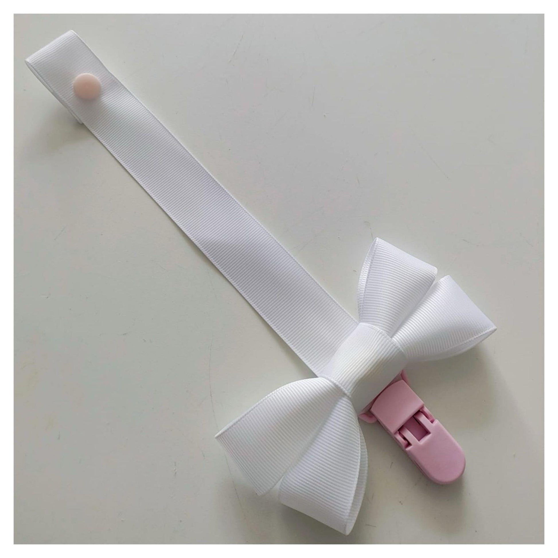White Dummy With Bow And Pink Clip